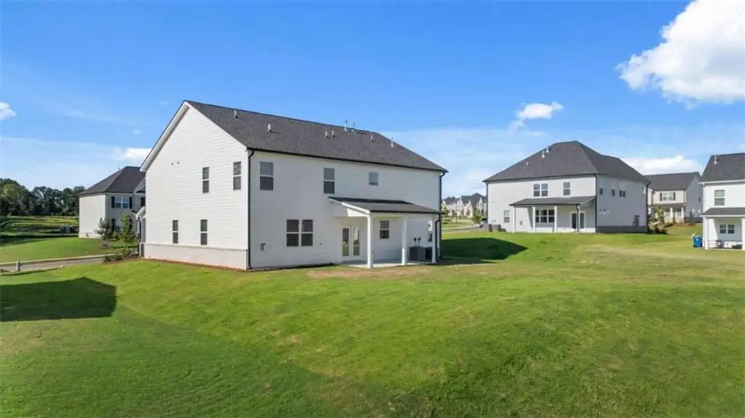Exterior details and patio area of a home in Independence, Loganville (Image 4).