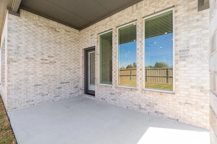 Exterior details and patio area of a home in The Colony - 45', Bastrop (Image 18).