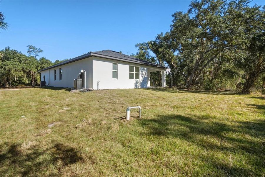 Exterior details and patio area of a home in , Port Charlotte (Image 4). Exterior details and patio area of a home in , Port Charlotte (Image 4).