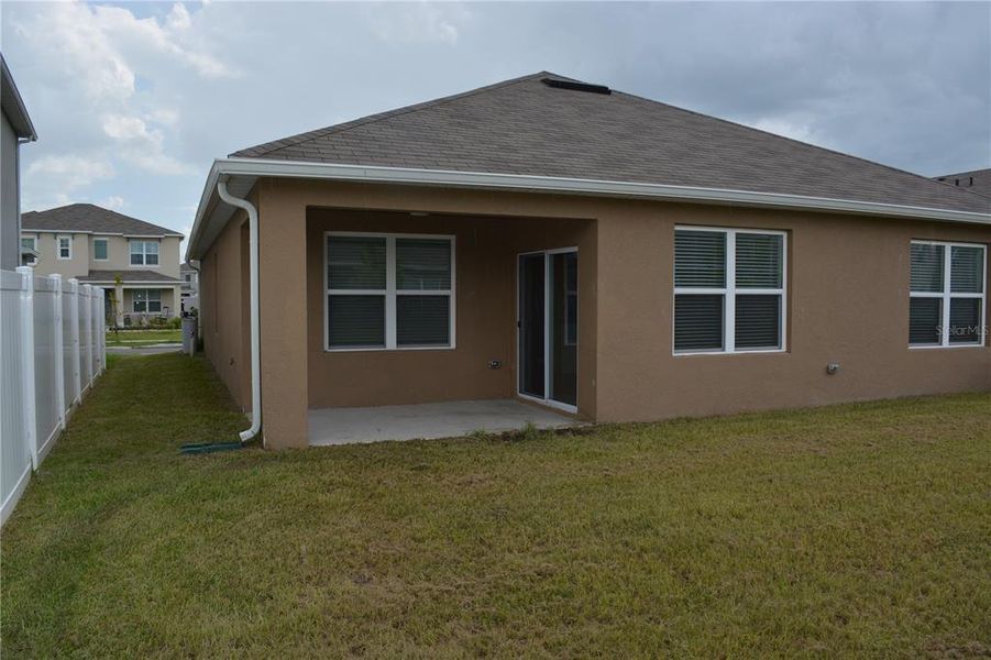 Front exterior of a new home in , Lakeland, FL, highlighting curb appeal (Image 14).