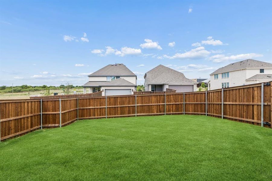 Exterior details and patio area of a home in Karis, Crowley (Image 18).