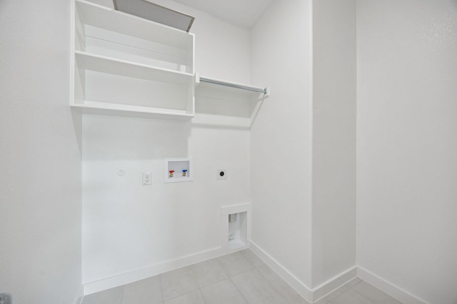 Utility Room in the Masters home plan by Trophy Signature Homes – REPRESENTATIVE PHOTO