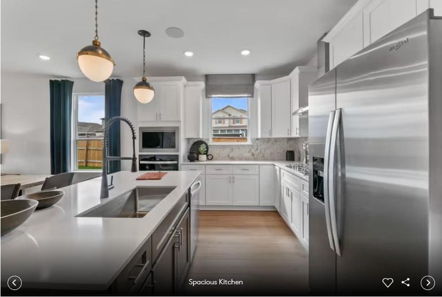 Interior photos- Photo of Pulte model home with same floor plan, not of actual home listed.