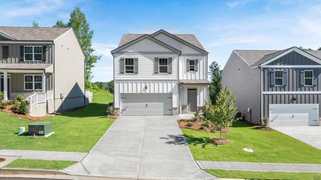 Front exterior of a new home in Oconee Overlook, Gainesville, GA, highlighting curb appeal (Image 2). Front exterior of a new home in Oconee Overlook, Gainesville, GA, highlighting curb appeal (Image 2).