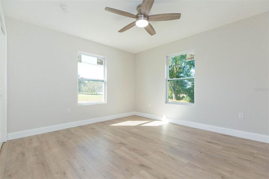Spacious, unfurnished interior of a new home in , Dade City (Image 35).