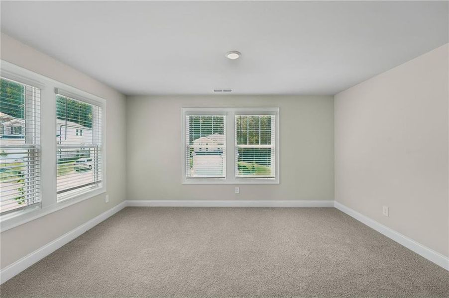Spacious, unfurnished interior of a new home in Hemingway - Reserve Series, Cumming (Image 40).