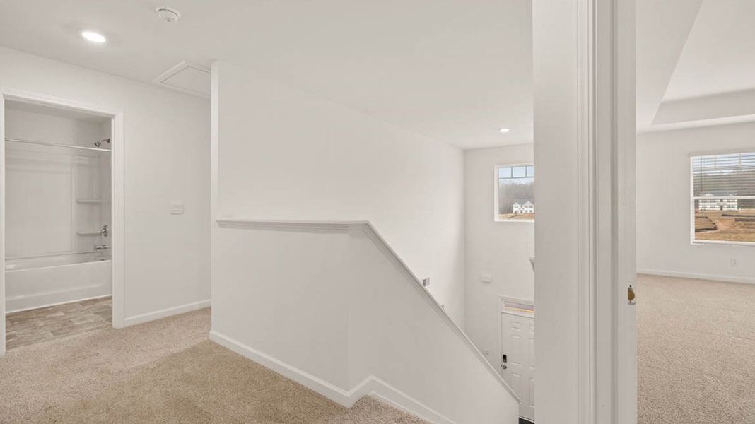 Representative unfurnished interior of a home built from the Packard by D.R. Horton in Evergreen Crossing, Locust Grove (Image 26).