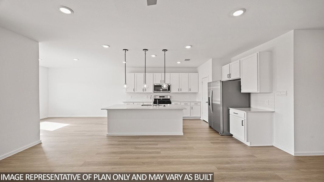 Furnished interior view inside a new home in Sunterra, Katy (Image 4).