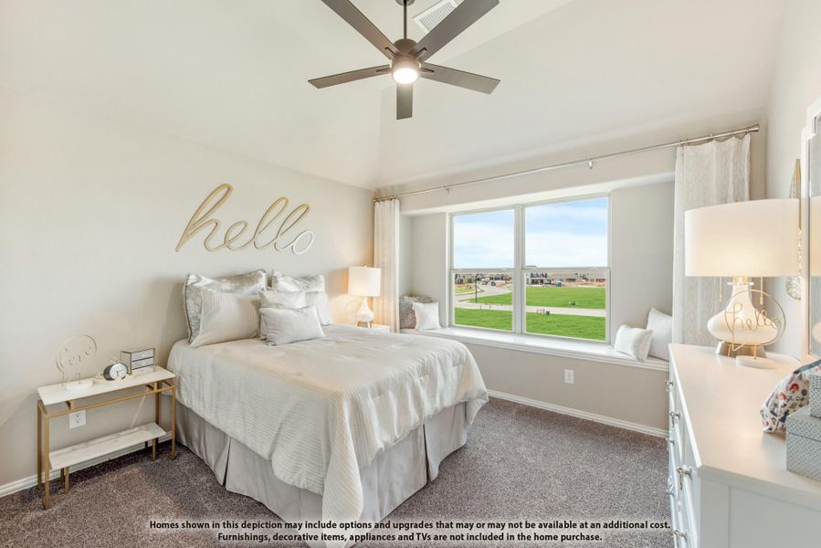Bedroom with vaulted ceiling, ceiling fan, window seat, and carpet flooring