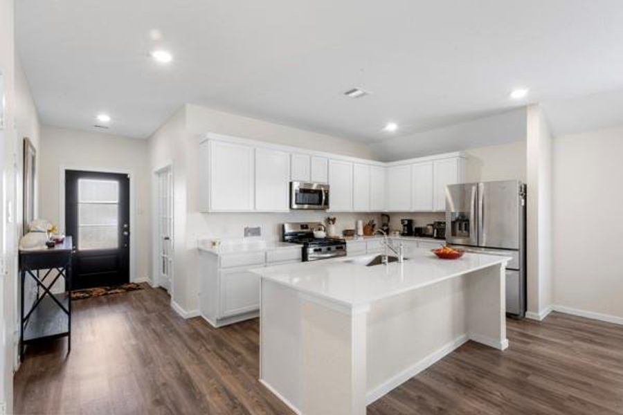 Furnished interior view inside a new home in Sterling Point at Baytown Crossings: Wildflower II Collection, Baytown (Image 7).