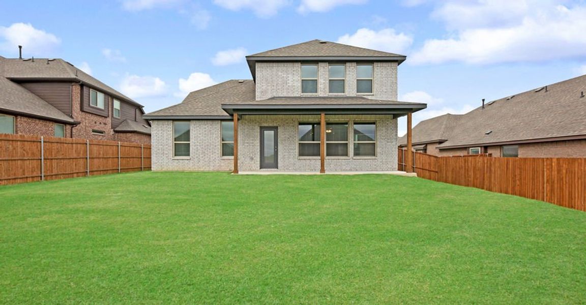 Representative exterior photo of a completed home built from the Stirling by Impression Homes in Timberbrook, Justin, TX (Image 23). Representative exterior photo of a completed home built from the Stirling by Impression Homes in Timberbrook, Justin, TX (Image 23).