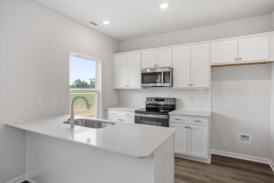 Furnished interior view inside a new home in Cambridge Reserve, Angier (Image 6).