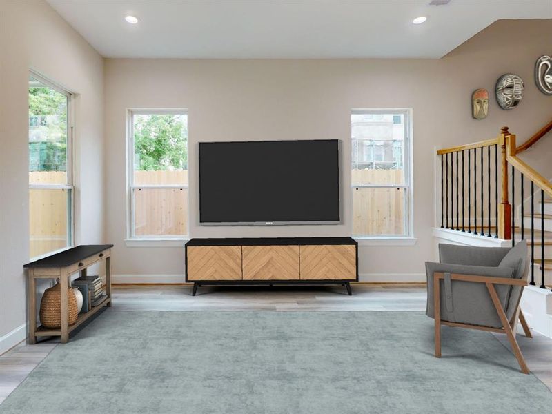 The ROCburne's living room was designed to be both elegant and versatile, allowing for various furniture layouts to suit the homeowner's lifestyle. Rooms are virtually staged and the floor plan shown is from a similar home in another community. Actual layouts and furnishings may vary. Please visit the property for accurate details.