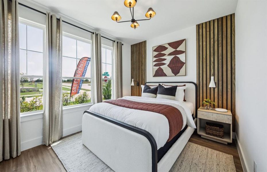 Secondary bedroom designed for comfort and convenience *Model representation