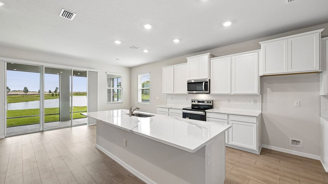 Representative furnished interior of a home built from the Laurel by D.R. Horton in Star Farms at Lakewood Ranch, Bradenton (Image 6).