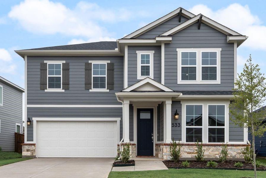 Front exterior of a new home in Creekside of Crowley, Crowley, TX, highlighting curb appeal (Image 2).