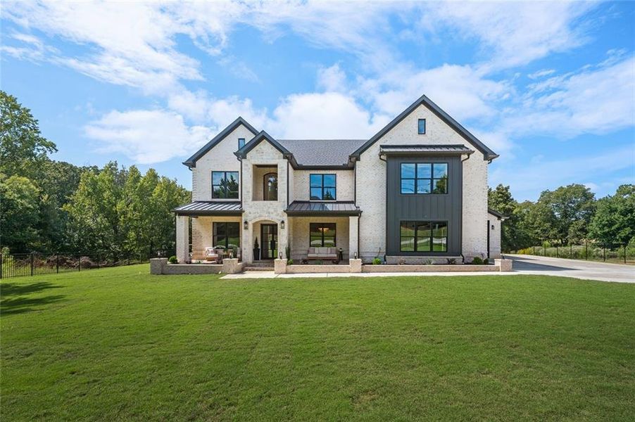 Front exterior of a new home in , Lawrenceville, GA, highlighting curb appeal (Image 24).
