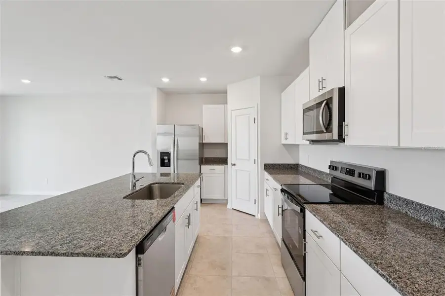 Furnished interior view inside a new home in Crosswinds - Signature Series, Haines City (Image 6).