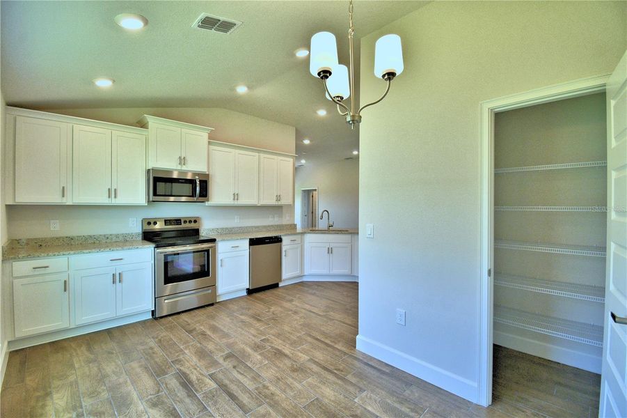 Furnished interior view inside a new home in Lake Juliana Estates, Auburndale (Image 8).