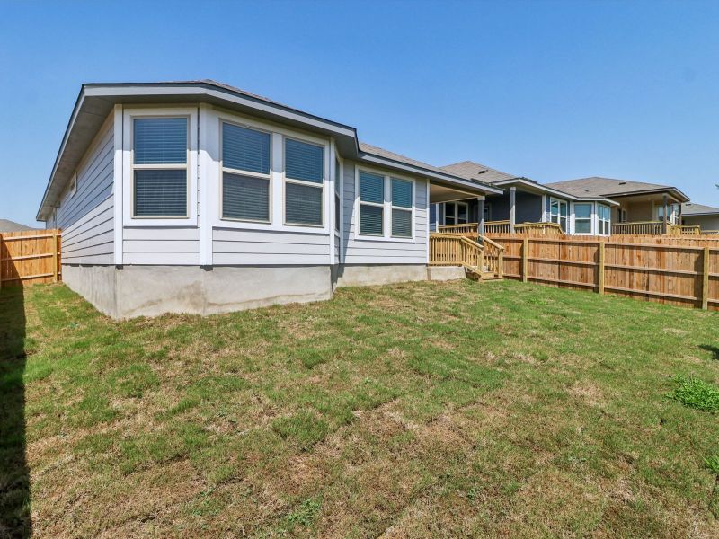 Back exterior of the Callaghan floorplan at a Meritage Homes community. Back exterior of the Callaghan floorplan at a Meritage Homes community.