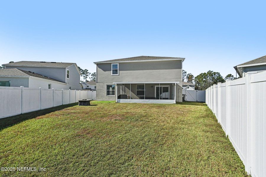 Exterior details and patio area of a home in Village Park, Green Cove Springs (Image 28).