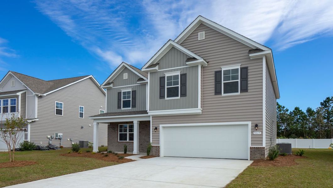 Front exterior of a new home in Chapman Village, Conway, SC, highlighting curb appeal (Image 16).