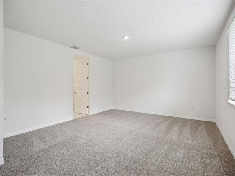 Spacious, unfurnished interior of a new home in Salt Meadows - Signature Series, Parrish (Image 33). Spacious, unfurnished interior of a new home in Salt Meadows - Signature Series, Parrish (Image 33).