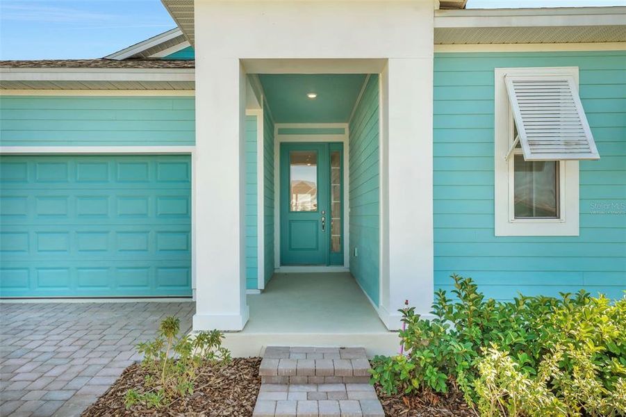 Exterior details and patio area of a home in Green Key Village, Lady Lake (Image 28).