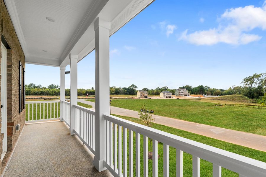 Exterior details and patio area of a home in Lilah Grove, Summerfield (Image 3).