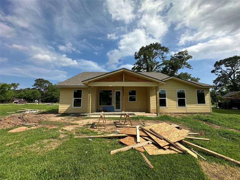 In-progress construction of a new home in , Jones Creek, TX (Image 9).