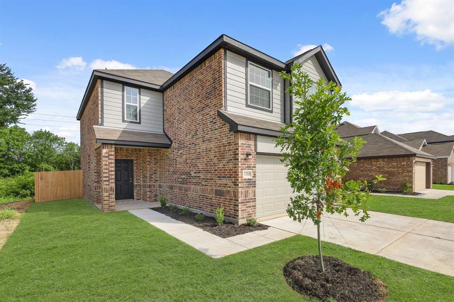 Front exterior of a new home in Christian Meadows, Ennis, TX, highlighting curb appeal (Image 26).