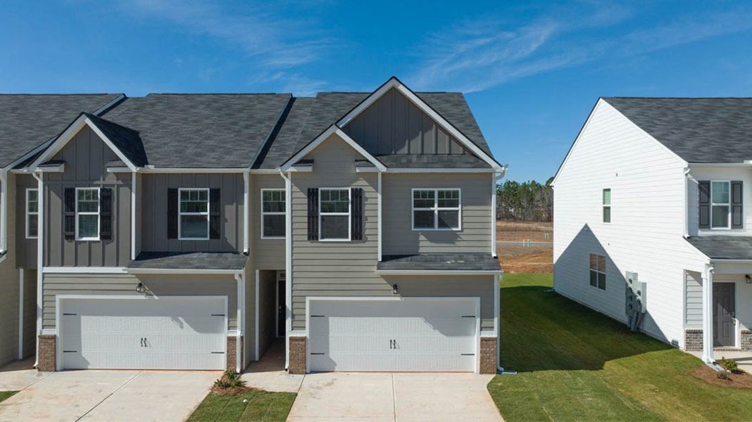 Front exterior of a new home in Laurel Park Townhomes, Hephzibah, GA, highlighting curb appeal (Image 18).