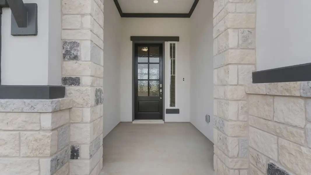 Exterior details and patio area of a home in Santa Rita Ranch, Liberty Hill (Image 3).