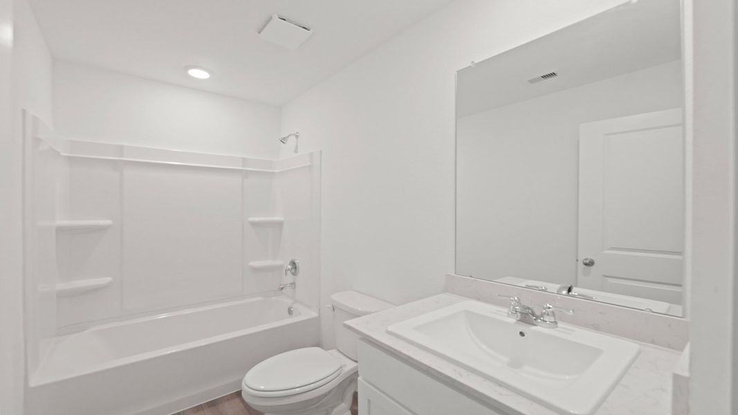 Representative furnished interior of a home built from the Plan by D.R. Horton in Lexington Heights, Willis (Image 10).