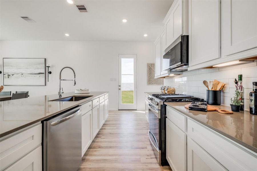 Furnished interior view inside a new home in Bridgeland, Cypress (Image 5).