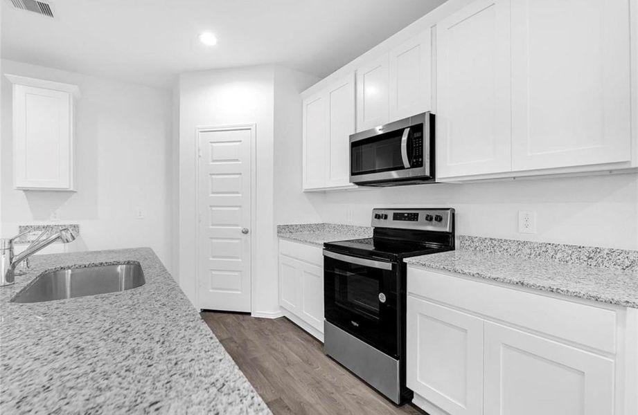 Furnished interior view inside a new home in , Sealy (Image 6).