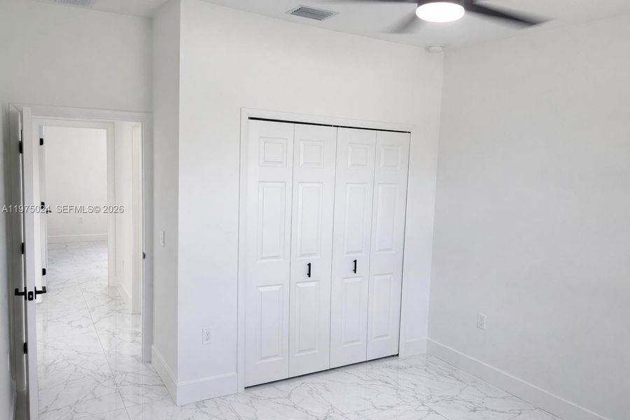 Spacious, unfurnished interior of a new home in , Lehigh Acres (Image 8).