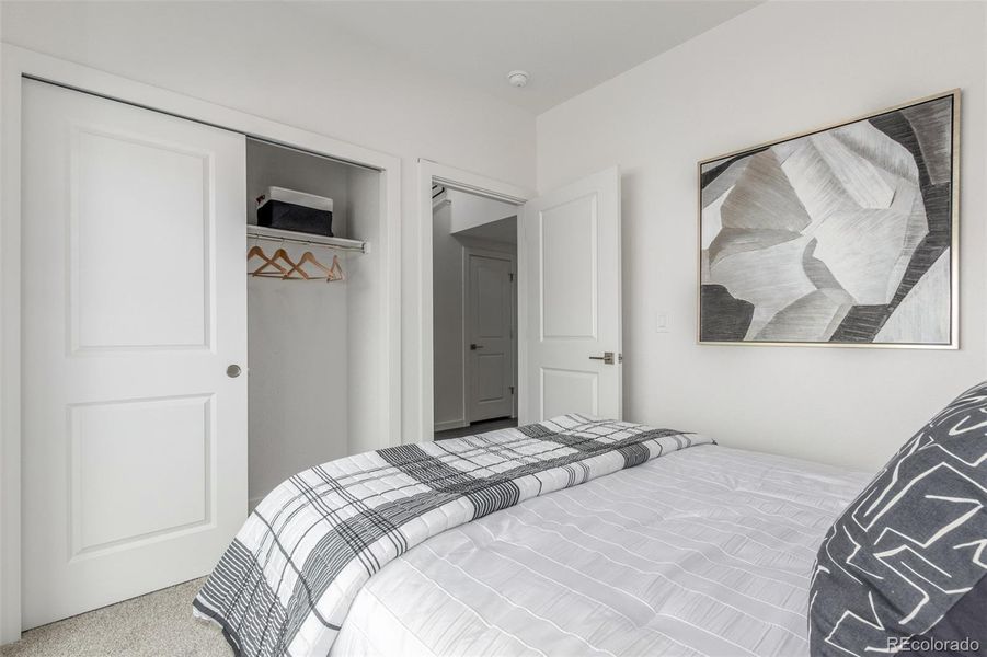 Furnished interior view inside a new home in The Commons at Victory Ridge, Colorado Springs (Image 27).
