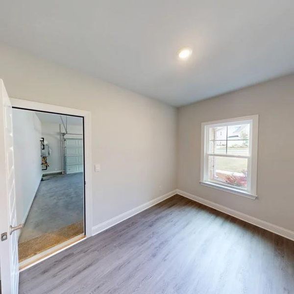 Spacious, unfurnished interior of a new home in Mirror Lake at South Harbour, Villa Rica (Image 19).