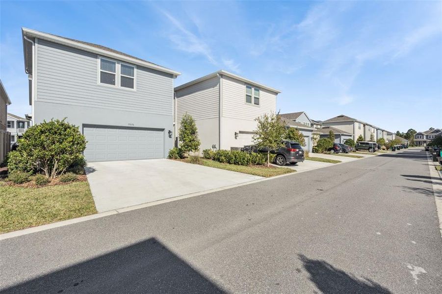 Front exterior of a new home in , Winter Garden, FL, highlighting curb appeal (Image 29).