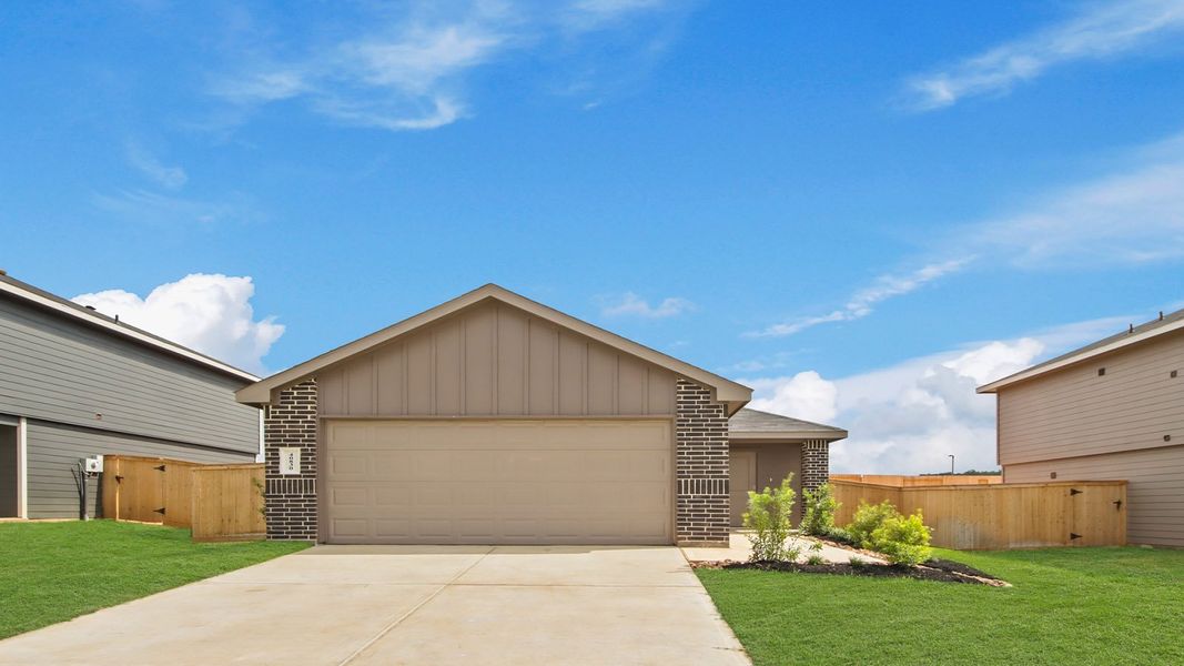 Front exterior of a new home in Mill Creek, Magnolia, TX, highlighting curb appeal (Image 1). Front exterior of a new home in Mill Creek, Magnolia, TX, highlighting curb appeal (Image 1).
