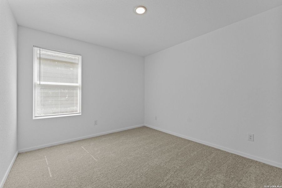 Spacious, unfurnished interior of a new home in Higdon Crossing, San Antonio (Image 26).