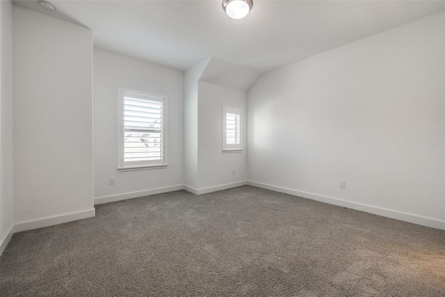 Bedroom 5 with carpet, blinds