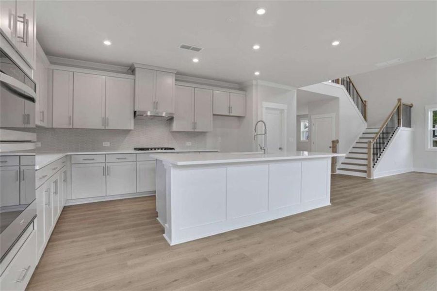 Furnished interior view inside a new home in The Paddocks at Doc Hughes, Buford (Image 9).