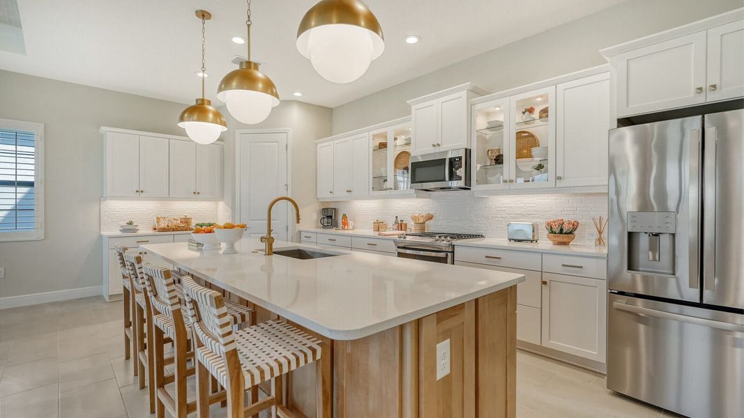 Furnished interior view inside a new home in SkySail Real Estate and Homes for Sale in Naples, FL - Neal Communities, Naples (Image 11).