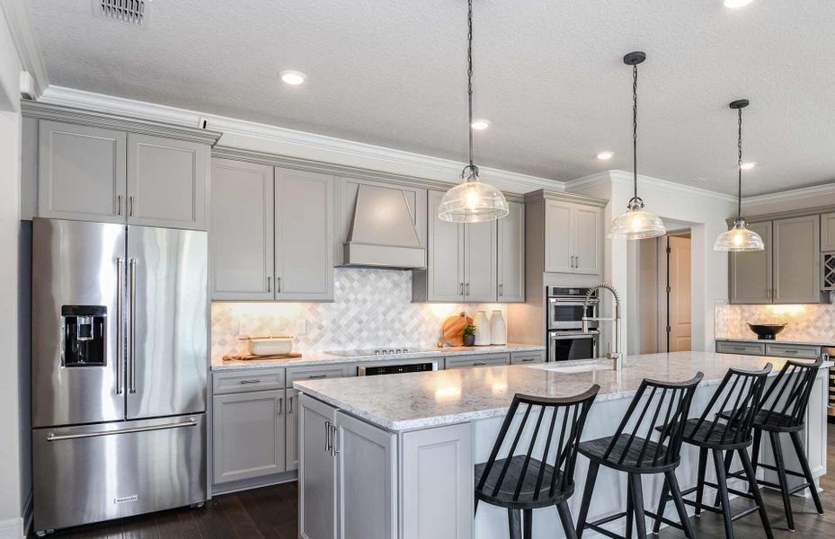 Open Kitchen with Island and Stainless Steel Appliances, perfect for a buffet style meal