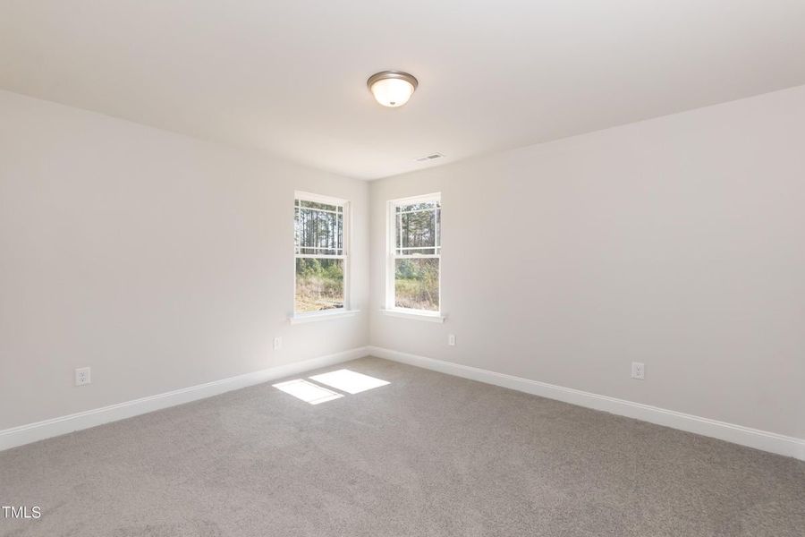 Representative unfurnished interior of a home built from the 2721 by Adams Homes in Hidden Pines, Cameron (Image 30).
