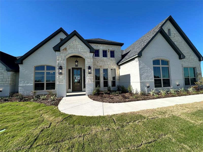 Front exterior of a new home in , Decatur, TX, highlighting curb appeal (Image 1). Front exterior of a new home in , Decatur, TX, highlighting curb appeal (Image 1).