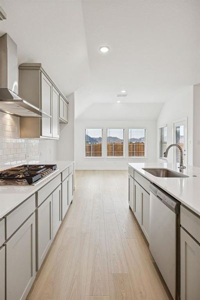 Kitchen in the Gilmour II home plan by Trophy Signature Homes – REPRESENTATIVE PHOTO