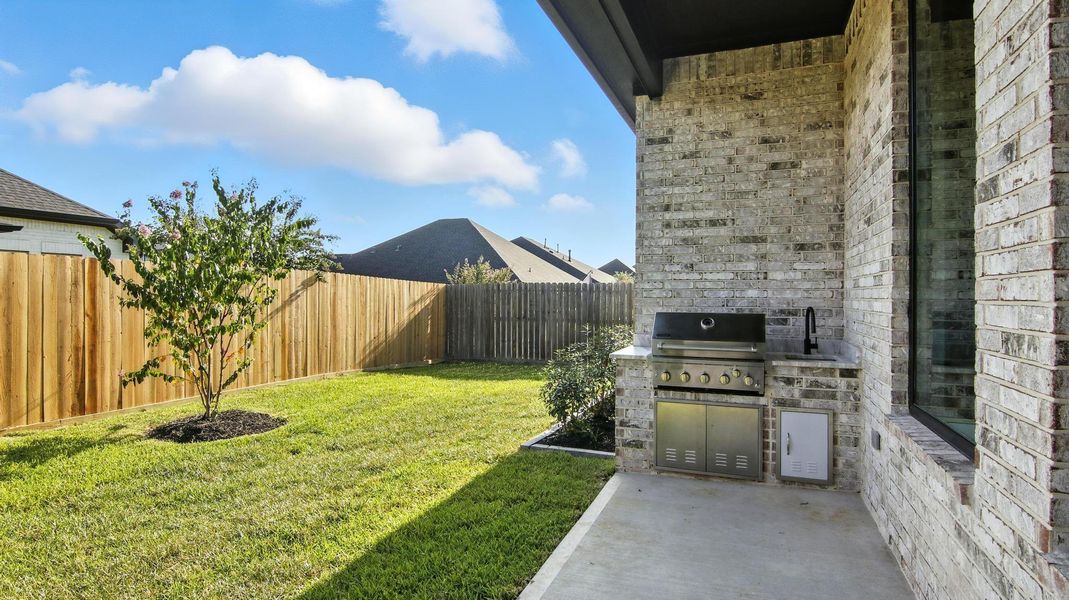 The built-in stainless steel grill makes weekend barbecues effortless, while the lush green lawn provides plenty of space for kids or pets to play. The brick exterior adds timeless charm and durability, complemented by large windows that allow natural light to flow seamlessly into the home. The built-in stainless steel grill makes weekend barbecues effortless, while the lush green lawn provides plenty of space for kids or pets to play. The brick exterior adds timeless charm and durability, complemented by large windows that allow natural light to flow seamlessly into the home.